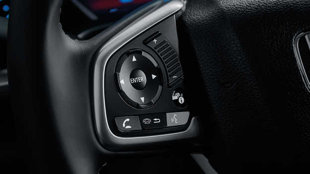 Primer plano de los botones del volante