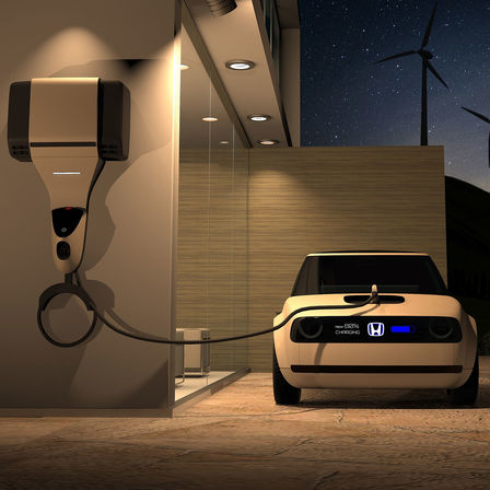Vista delantera del Honda Urban EV Concept cargándose.