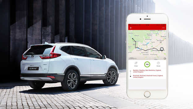 Aplicación My Honda en un teléfono sostenido en una mano