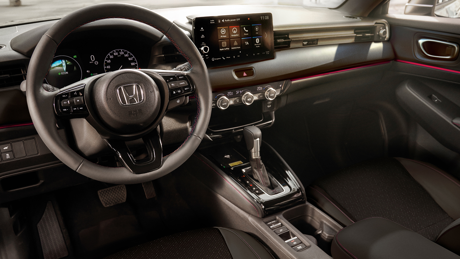 Interior del asiento delantero del conductor y salpicadero del HR-V.