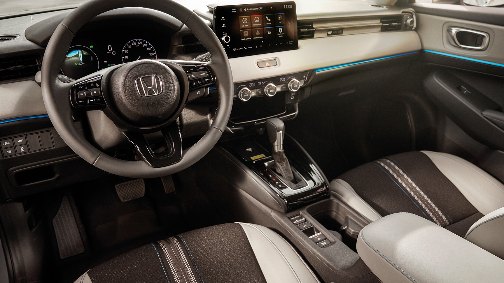 Interior del asiento del conductor delantero y del tablero del HR-V. 